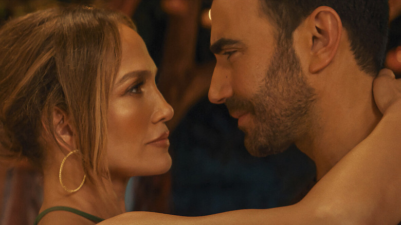 Jennifer Lopez and Brett Goldstein slow dance in Office Romance