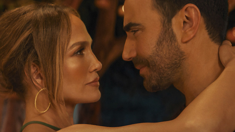 Jennifer Lopez and Brett Goldstein slow dance in Office Romance