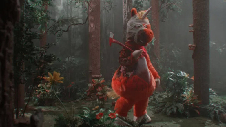 Buddy goes a-hunting in the woods with an axe in Buddy