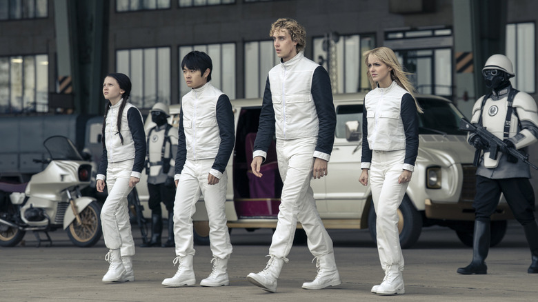 Lou Lou Wyatt Haymitch and Maysilee walking to the arena pods in The Hunger Games: Sunrise on the Reaping