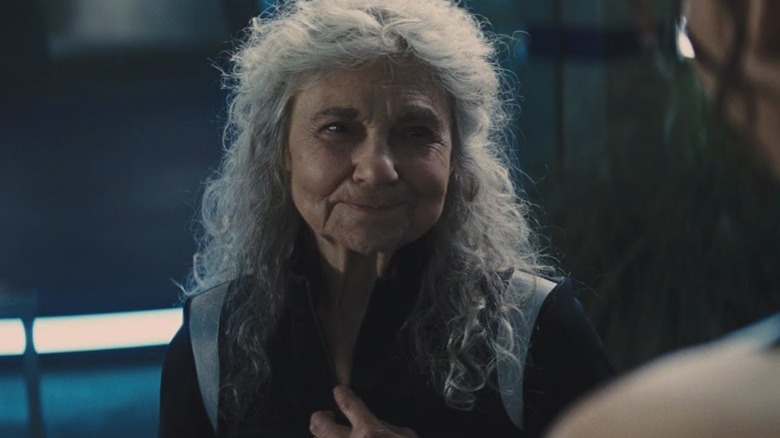 Mags smiling in The Hunger Games: Catching Fire