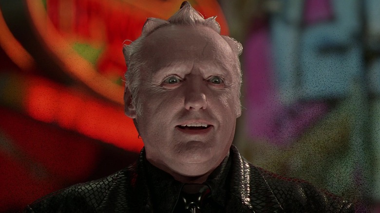 King Koopa smiling and disintigrating in Super Mario Bros.