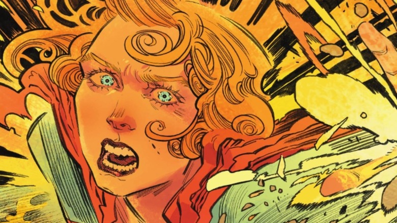 Supergirl using her hand to stop an explosion