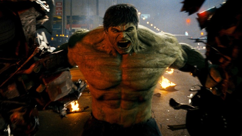 The Hulk holding two halves of a car during the final battle in The Incredible Hulk (2008)