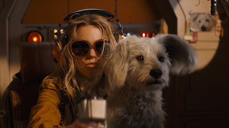 Milly Alcock as Supergirl with Krypto in Supergirl (2026)