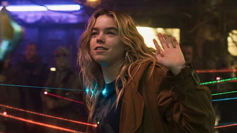 Milly Alcock's Supergirl having lasers pointed at her