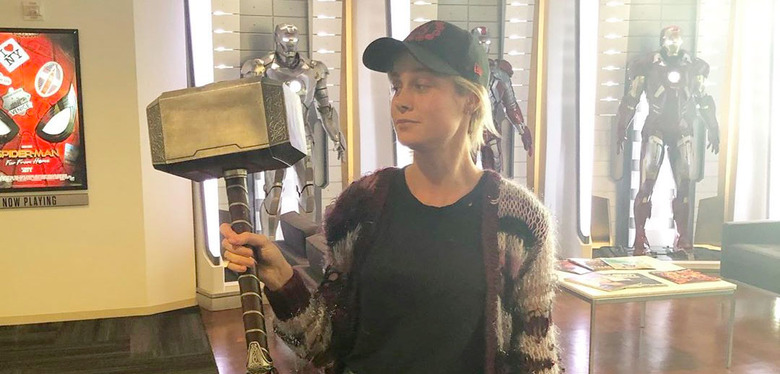 Brie Larson Holding Mjolnir