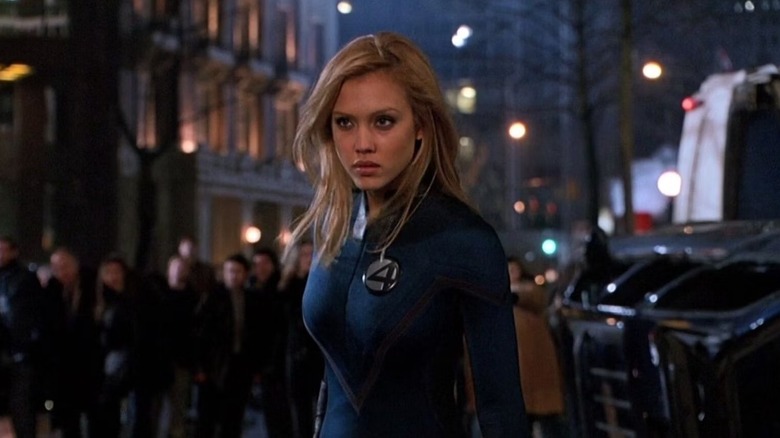 Invisible Woman standing in street
