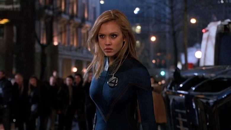 Invisible Woman standing in street