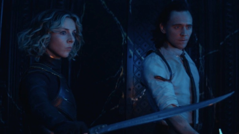 Loki and Sylvie ready to fight.