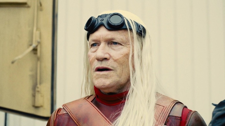 Michael Rooker's Savant wearing goggles on his head in The Suicide Squad