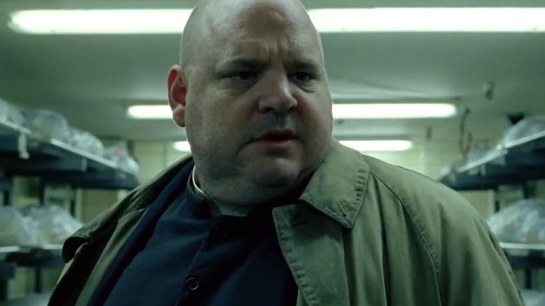 Pruitt Taylor Vince's Father Hennessy looking to the side in Constantine