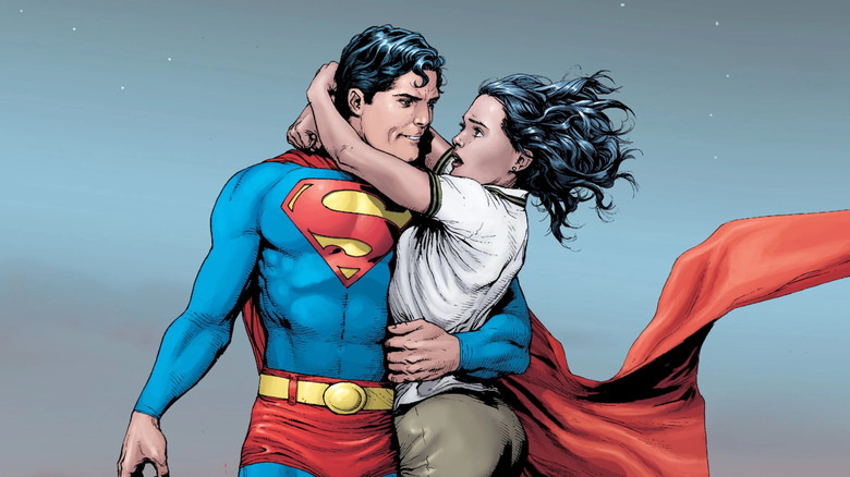 Superman and Lois Lane fly above Metropolis