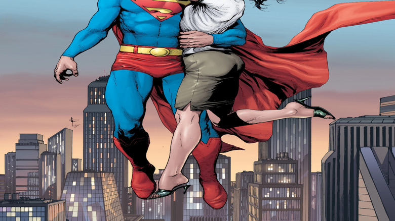 Superman and Lois Lane fly above Metropolis