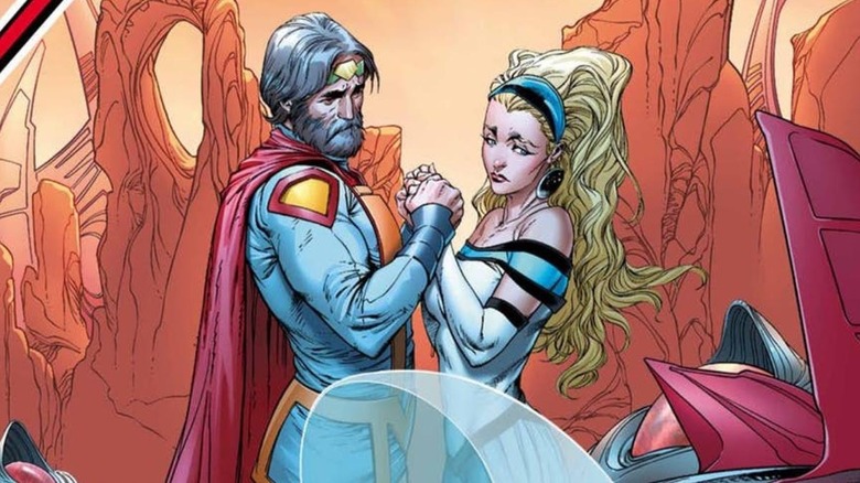 Zor-El and Alura In-Ze look sadly at a space craft