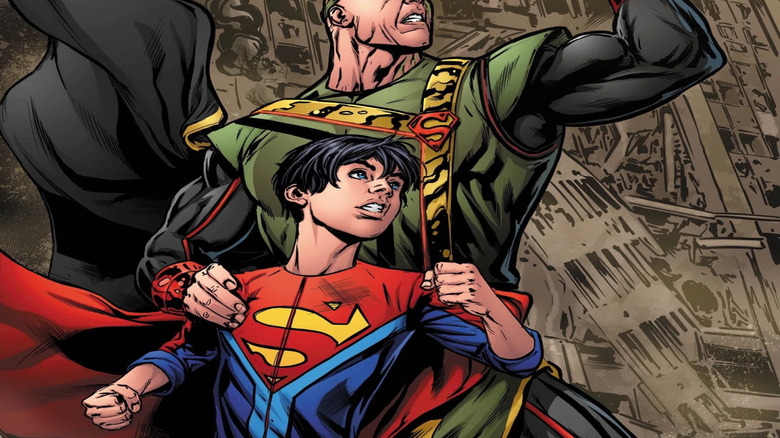 Jor-El with Jon Kent in front of a destroyed building