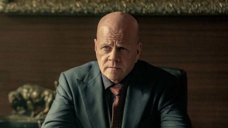 Michael Cudlitz as Lex Luthor, sitting in his office in Superman and Lois