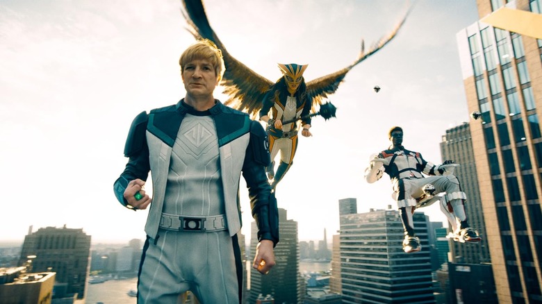 Guy Gardner, Hawgirl, and Mister Terrific floating in the air in Metropolis in Superman (2025)
