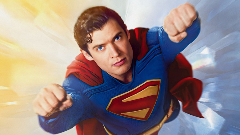 David Corenswet's Superman soaring through the air on a poster for Superman