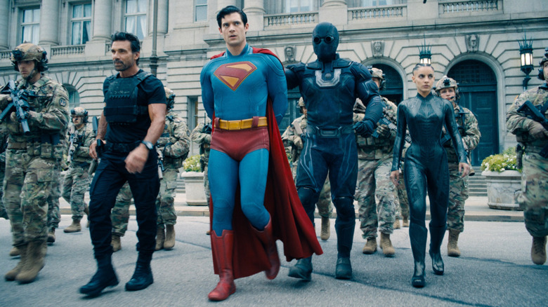 Superman gets taken into custody by Rick Flag, Sr., Ultraman, and the Engineer