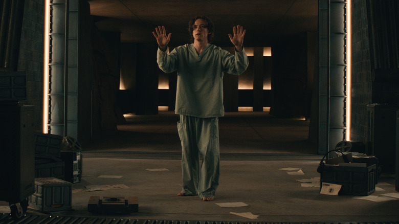 Bob (Bill Pullman) stands with his hands up in Thunderbolts