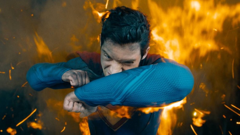 Superman (David Cornsuin) protects itself from fire in Superman (2025)