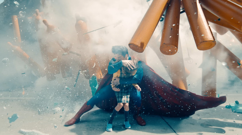 Superman saving a child from an explosion in Superman