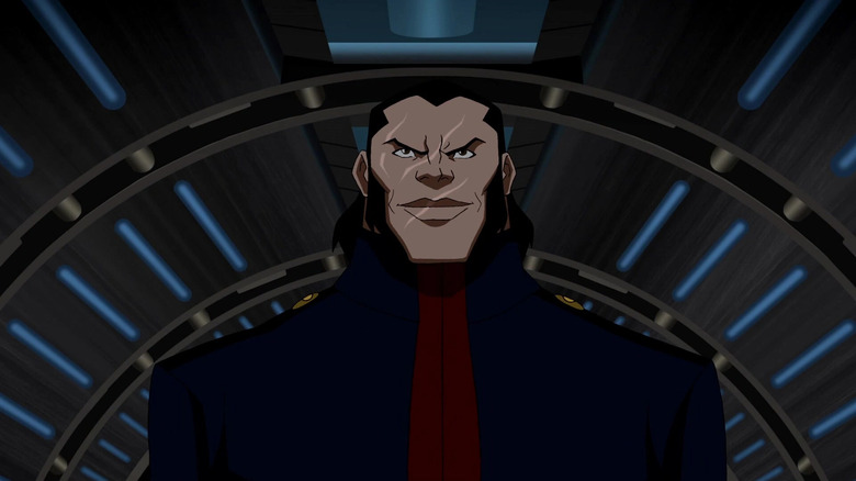 Vandal Savage has a smile that is arrogant to his face in young justice