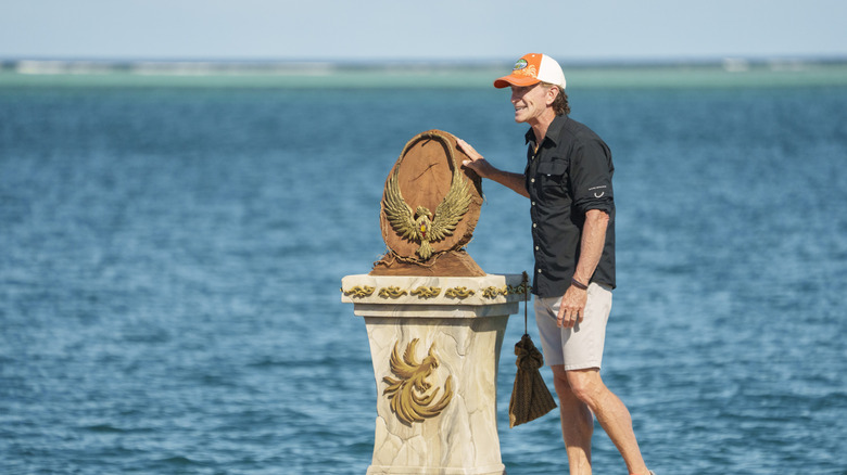 Probst standing by the immunity idol on Survivor 50