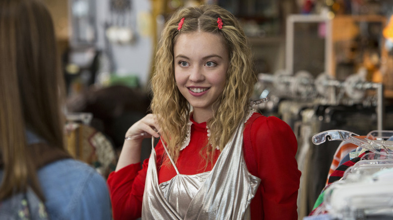 Sydney Sweeney as Emaline trying on clothes in Everything Sucks!
