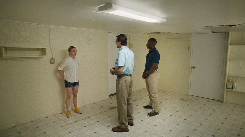 Sydney Sweeney as Reality interrogated by two FBI agents