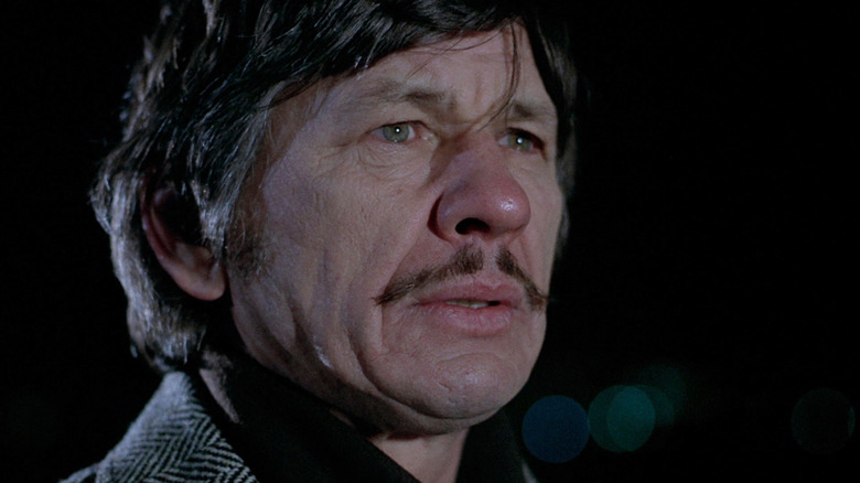 Paul Kersey staring somberly in Death Wish