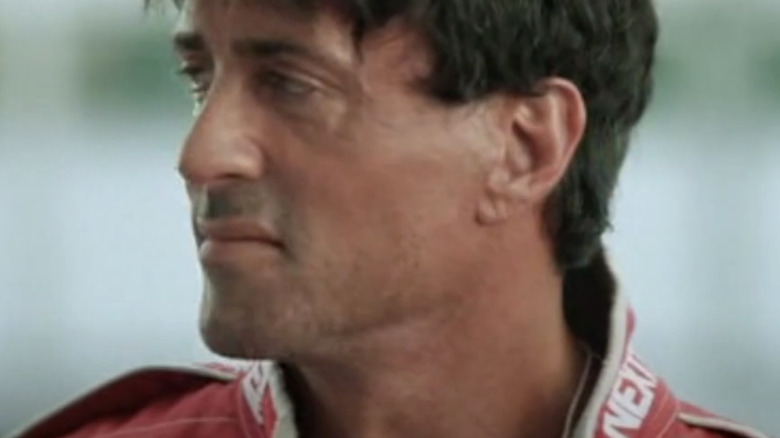 Sylvester Stallone's Joe The Hummer Tanto looks off to his right in Driven