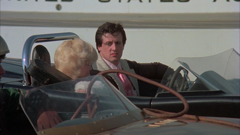 Sylvester Stallone's Joe Machine Gun Viterbo drives his car in Death Race 2000