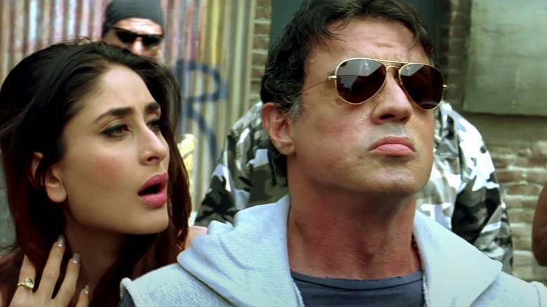 Sylvester Stallone stands in front of Kareena Kapoor's Simrita Rai in Kambakkht Ishq