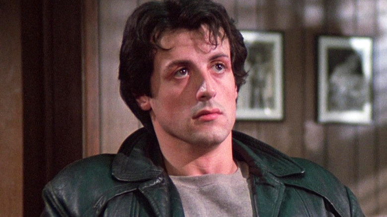 Sylvester Stallone's Rocky Balboa sits in an office in Rocky