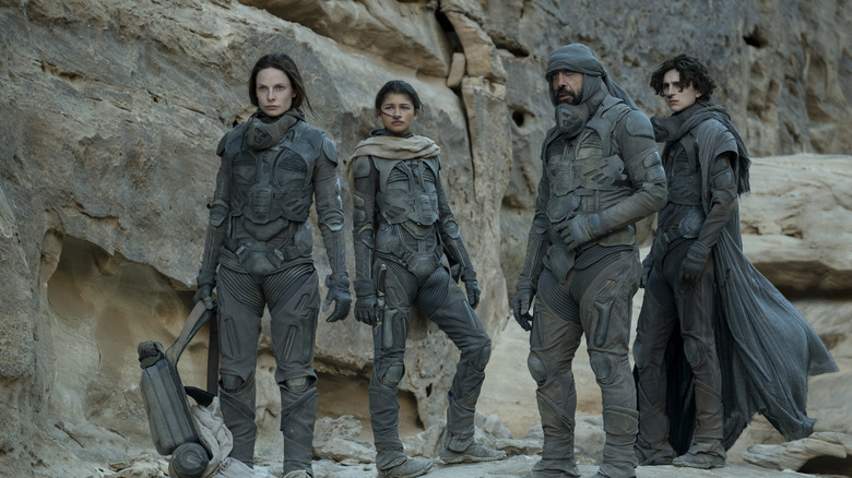 REBECCA FERGUSON as Lady Jessica Atreides, ZENDAYA as Chani, JAVIER BARDEM as Stilgar, and TIMOTHÉE CHALAMET as Paul Atreides in Warner Bros. Pictures' and Legendary Pictures' action adventure "DUNE," a Warner Bros. Pictures and Legendary release.