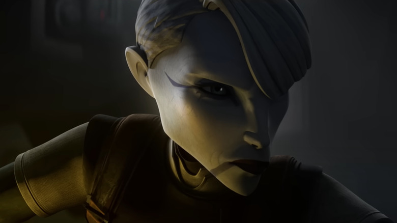 Asajj Ventress lit by her yellow lightsaber in Star Wars: Tales of the Underworld