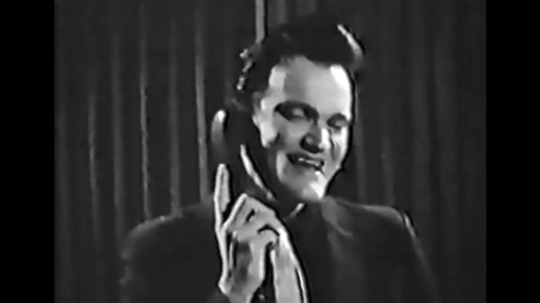 Young Tarantino on the phone