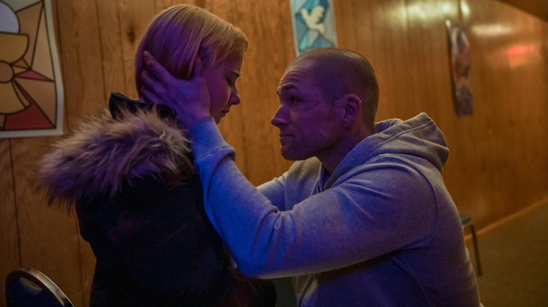 She Rides Shotgun - Nate (Taron Egerton) cradling Polly's (Ana Sophia Heger) face