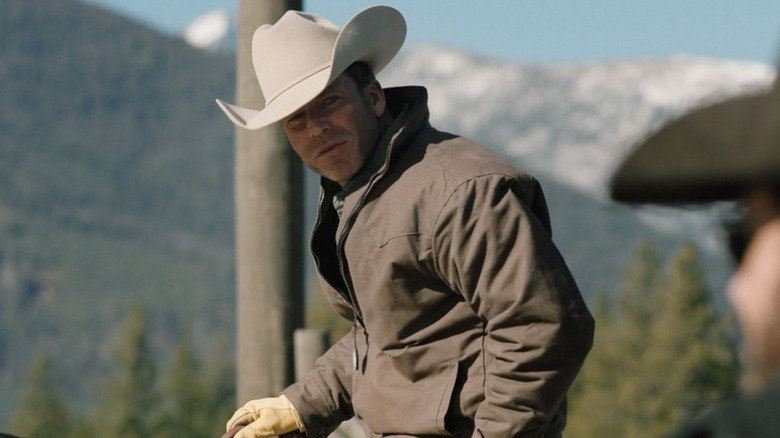 Travis Wheatley leaning over on "Yellowstone"