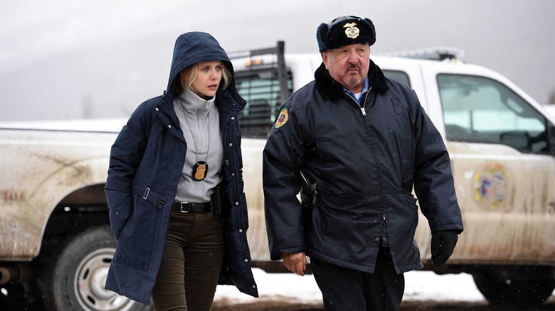 Elizabeth Olsen as FBI Agent Jane Banner with Graham Greene as tribal police chief Ben in Wind River