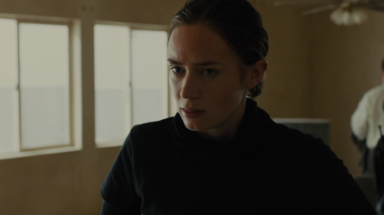 Emily Blunt's Kate Macer looks worried in closeup in Sicario