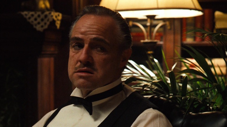 Don Vito Corleone wearing a tuxedo in The Godfather