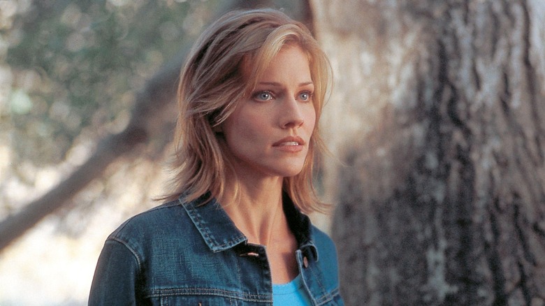 Tricia Helfer as Eva in the woods in White Rush