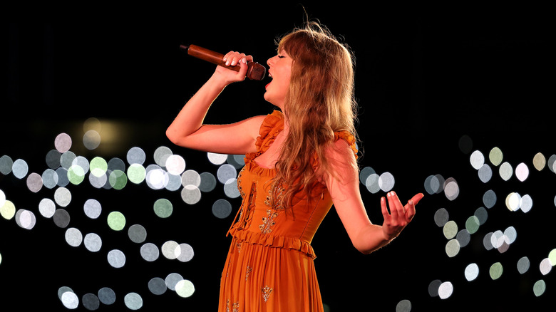 Taylor Swift performing the evermore set at the Eras Tour