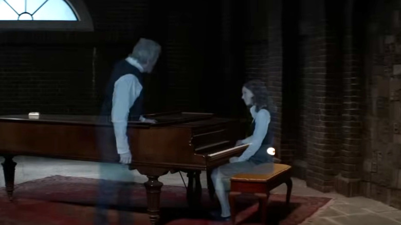 The Giver, a memory of the Giver and Rosemary sitting by the piano, talking