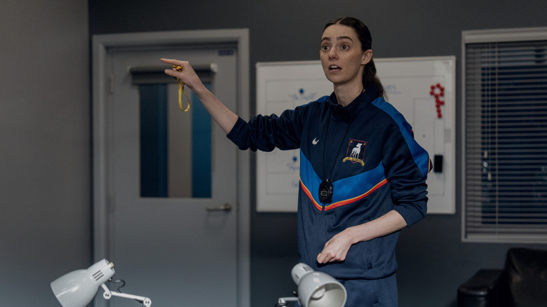 Coach Chilton points at the locker room in Ted Lasso Season 4