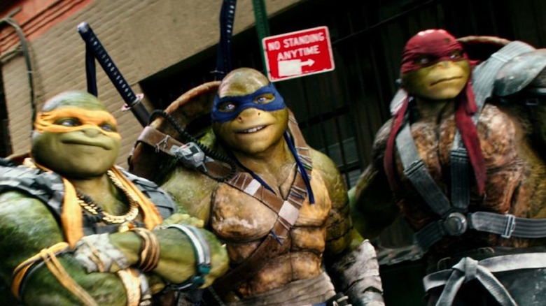 the TMNT chilling on top of a building