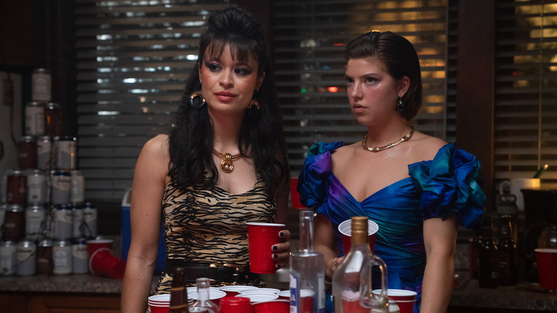 Pippa and Bree at a party looking suspicious on Tell Me Lies